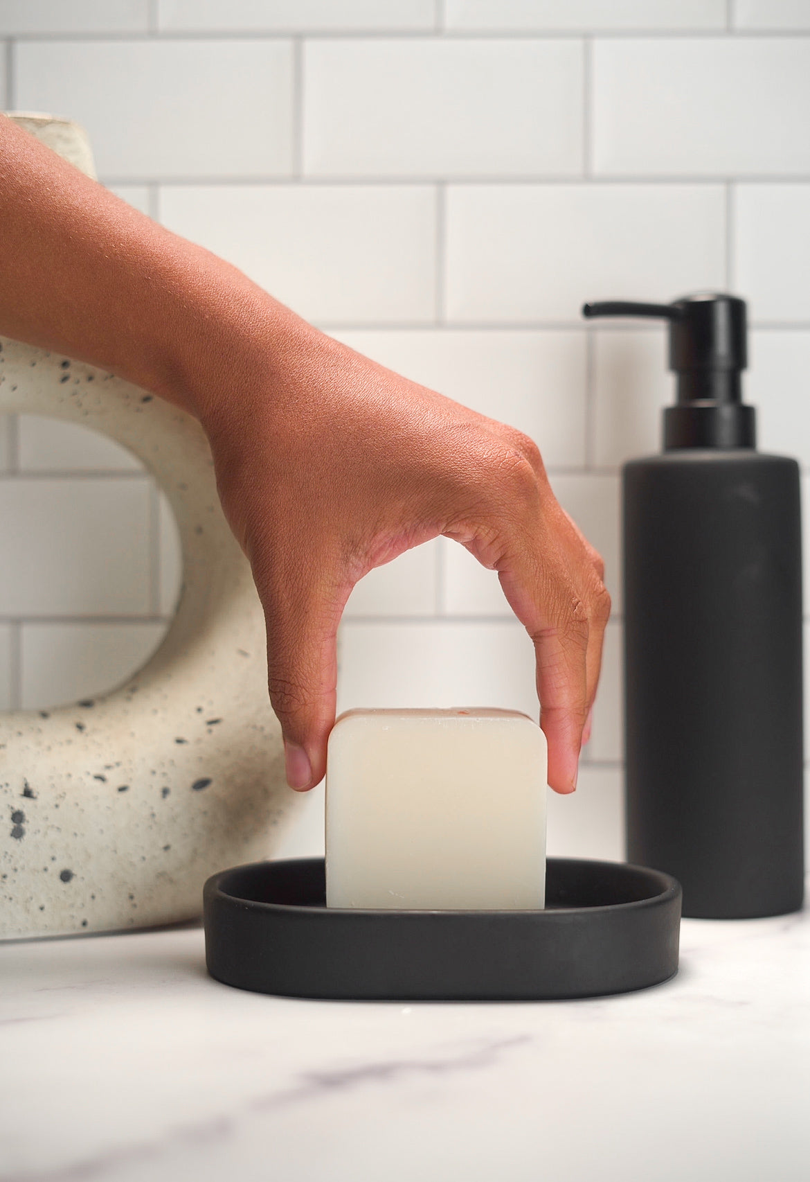 Barebase Bare Soap on ceramic dish in minimalist bathroom